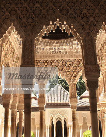 Ancient carved ornament and columns in Alhambra, Spain