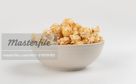 popcorn with caramel isolated on a white background
