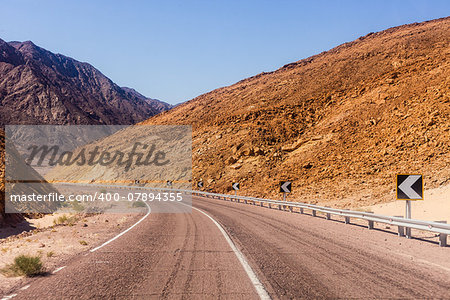 A desert road with mountains. Egypt.
