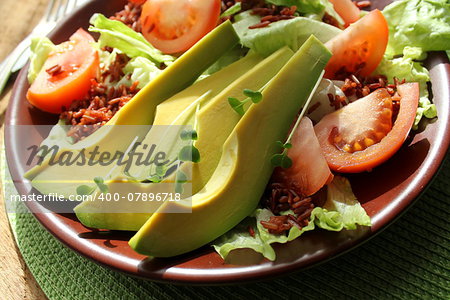 salad with avocado,tomatoes, lettuce,rice