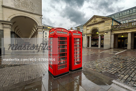 Red Telephone Box at Covent Garden Market on Rainy Day, London, United Kingdom