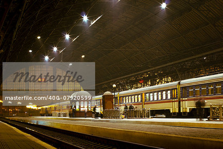 Train at railway station at night in Lvov, Ukraine