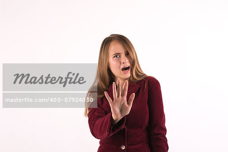 Serious woman making stop sign with his hand