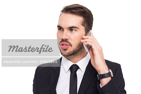 Smart businessman speaking on the phone on white background