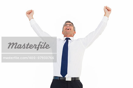 Excited businessman with glasses cheering on white background
