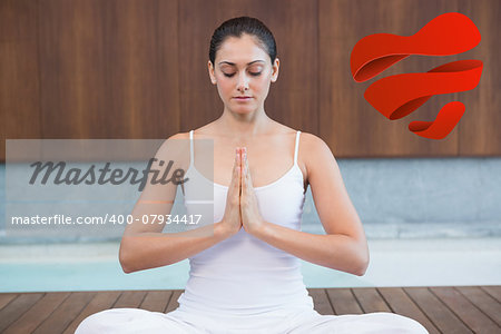 Peaceful woman in white sitting in lotus pose against heart