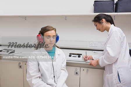 Student doing a hearing test at the university