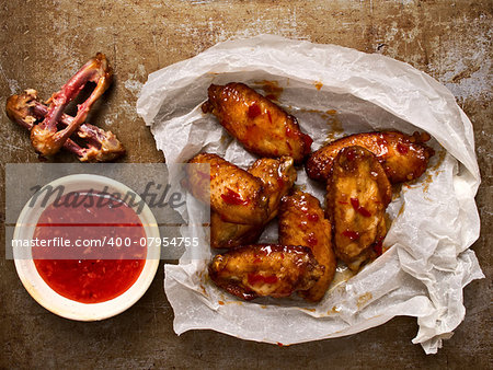 close up of rustic roasted buffalo chicken wing