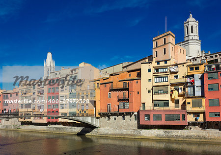 colorful old town of Girona on river Onyar, Spain