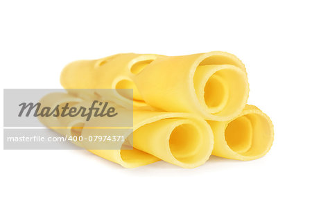 three rolled slices of Swiss cheese, served for breakfast or as a stylish snack, on white background