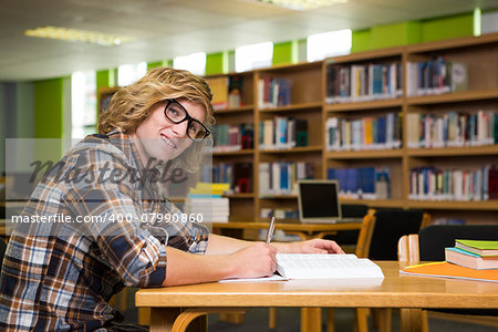 Student studying in the library at the university