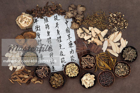 Large chinese herb selection with mandarin calligraphy script. Translation describes chinese herbal medicine as increasing the bodys ability to maintain body and spirit health and balance energy.