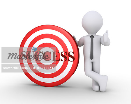 Businessman standing next to a target with success written on it and an arrow at the center