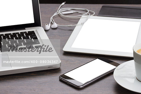 modern computer devices  - laptop, tablet and phone with copy space on screen