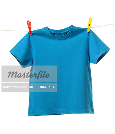 Blue shirt hanging on the clothesline. Image isolated on white background