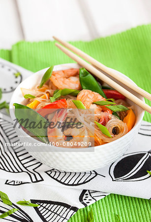 Rice glass (cellophane) noodles with shrimps and vegetables in white bowl