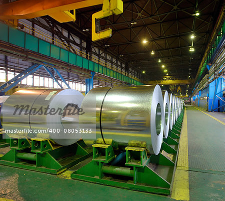 rolls of steel sheet stored in warehouse