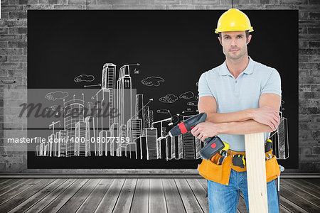 Confident carpenter with wooden plank and drill machine against composite image of black card