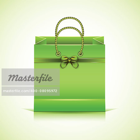 Green paper shopping bag isolated on white background.