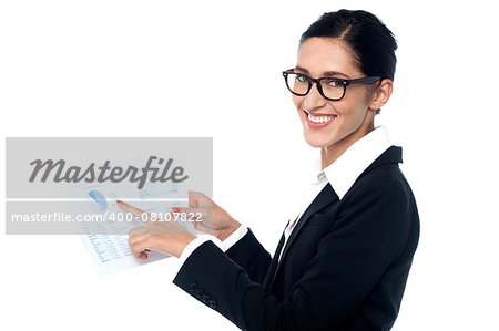 Female executive holding corporate documents