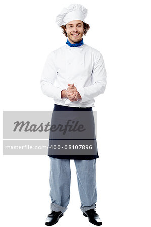 Smiling confident chef isolated over white
