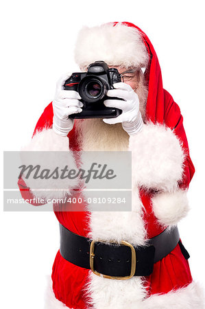 Santa claus taking photos with his new camera