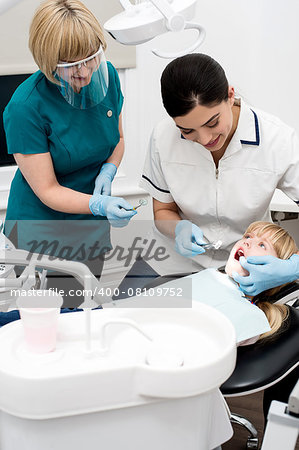 Professional dentist performing a dental procedure