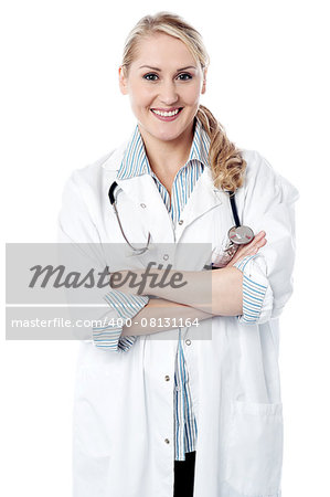 Smiling female doctor posing with folded arms