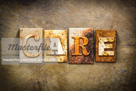 The word "CARE" written in rusty metal letterpress type on an old aged leather background.
