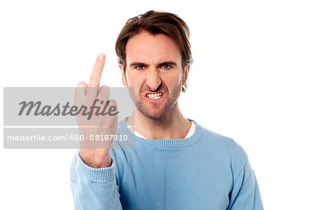 Evil gesture by angry young man