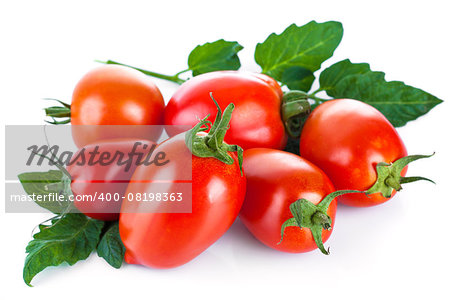 Fresh tomatoes with green leaves. Isolated on white background