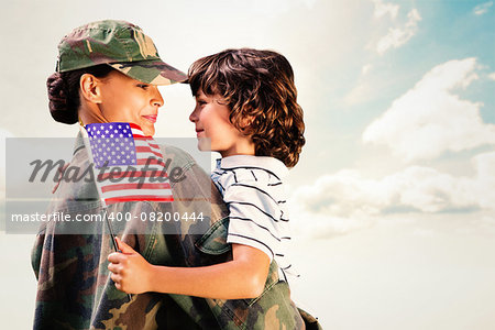 Solider reunited with son against blue sky