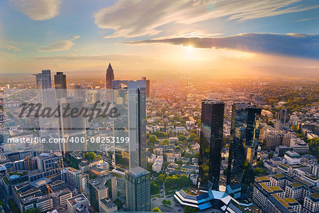 Aerial view of Frankfurt am Main skyline during golden hour.