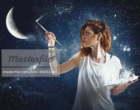 Girl paints the moon and the stars