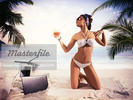 Businesswoman on summer vacation drinking a drink