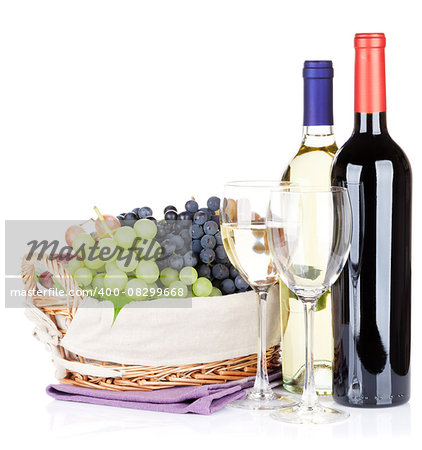 White and red wine bottles and grapes. Isolated on white background