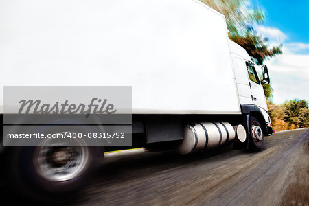 truck carrying merchandise.Close up image of wheels and rim