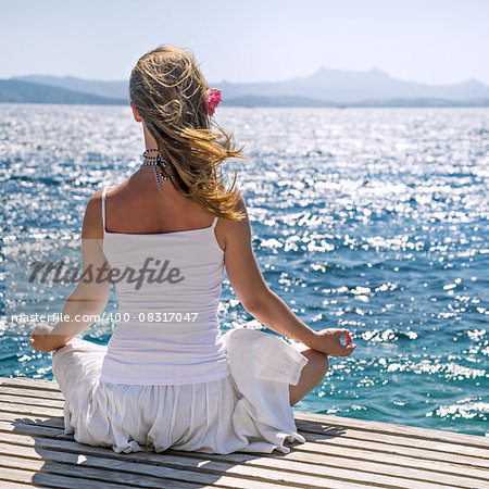 serenity and yoga practicing at the sea