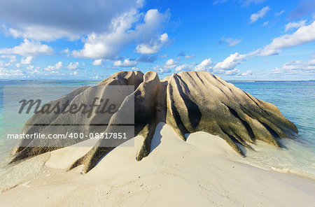 Beautifully shaped granite boulders and a perfect white sand at Anse Source d'Argent beach, La Digue island, Seychelles