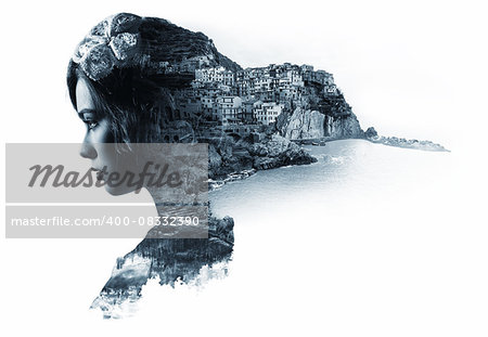 Double exposure portrait of a woman and view of Manarola. La Spezia, Liguria, northern Italy. Black and white image