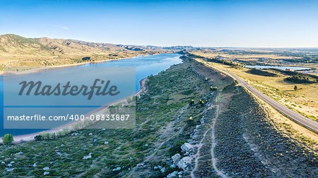 aerial panorama of northern part of the Horsetooth Reservoir with Centennial Road and hiking trails, Fort Collins, Colorado, late summer scenery