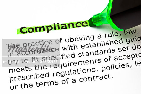 Definition of the word Compliance, highlighted with green felt tip pen.