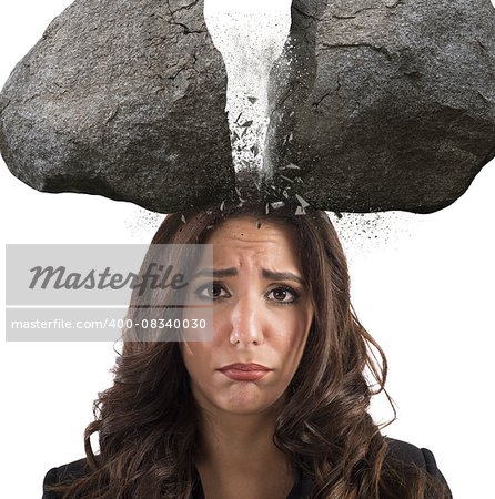 Businesswoman with split boulder above her head