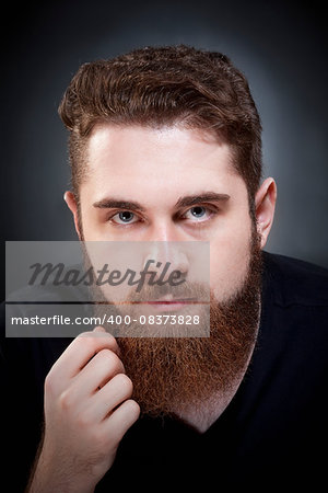 Portrait of a Teenage Hipster with Beard