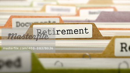File Folder Labeled as Retirement in Multicolor Archive. Closeup View. Blurred Image.