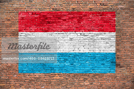 Flag of Luxembourg painted on brick wall