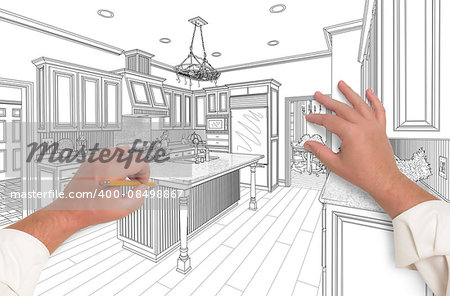 Male Hands Sketching with Pencil the Outline of a Beautiful Custom Kitchen.