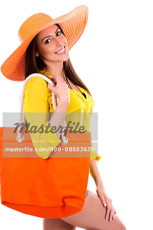 young woman wearing yellow shirt and orange hat on white background