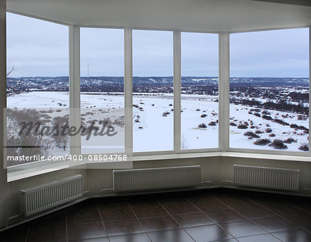 wide window of verandah overlooking the winter landscape
