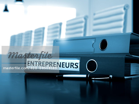 Entrepreneurs - Business Concept on Toned Background. Office Binder with Inscription Entrepreneurs on Working Table. Entrepreneurs - Illustration. 3D Toned Image.